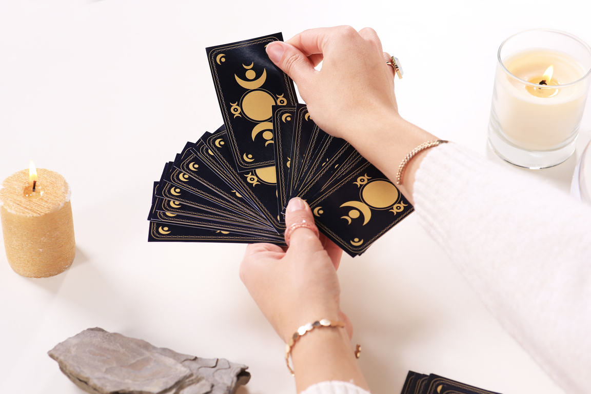 Soothsayer Pulling One Tarot Card at Table, Closeup. Future Tell